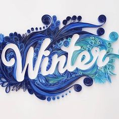 the word winter written in blue and white with swirls on it's side