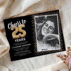 a black and gold 25th birthday party card with a photo on the front that says, cheers to 25 years