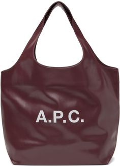 Grained faux-leather tote in burgundy. · Integrated shoulder straps · Logo printed at face · Open throat · Patch pocket at interior · Twill lining · H14.5 x W19 x D6.5 · Total Height: H23.5 Supplier color: Burgundy Burgundy Tote Bag For Work, Burgundy Workwear Tote Bag, Womens Tote Bags, A P, Leather Tote, Patch Pocket, Shoulder Straps, Apparel Accessories, The Face