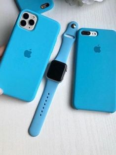 an apple watch and iphone case sitting next to each other on top of a table