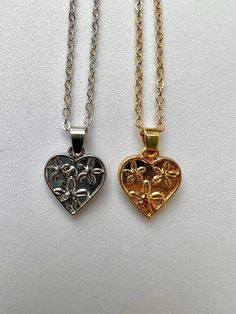 PLEASE NOTE:  - Price is for one necklace (£7.50).  - 2 Piece G/S Set: includes one gold and one silver necklace (£13.50) These mini dainty hearts with engraved flower necklace are simple yet beautiful. A perfect treat yourself gift or a gift for a loved one!  A cute present if you are searching for matching best friend necklaces. Necklace chain is approx. 45 cm (17.7  inches) with 6cm extending chain.  Gold Necklace made from 16k iron gold plated   Silver Necklace chains are made from stainless Best Friend Heart Necklace, Gold Matching Necklaces, Matching Friend Jewelry, Matching Gold Necklaces, Matching Best Friend Necklaces, Matching Best Friend Gifts, Bff Matching Jewelry, Matching Bff Necklaces, Matching Best Friend Jewelry