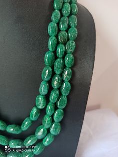 AAA 734 Carat Emerald beryl Oval Shape Fine Quality Smooth Beads With Adjustable Cord Necklace Stone : Emerald beryl Shape :- Oval Size :-6x8 - 12x17mm length - 18 inch, 3 line strings Weight :- 734 carat Polish :- Handmade color - green It is known as the 'love stone' as the message it emits is the strong vibration of unconditional love, joy, warmth and healing. As quartz crystals are profound amplifiers of energy, it may help to kindle happiness, love, romantic feelings and sensuality. It is g Elegant Emerald Necklace With Oval Gemstone Beads, Oval Gemstone Beads For Jewelry Making, Oval Gemstone Beaded Necklaces For Jewelry Making, Emerald Necklace With Oval Gemstone Beads For Jewelry Making, Oval Emerald Bead Necklace For Jewelry Making, Elegant Gemstone Oval Beads, Green Oval Gemstone Beads Necklace, Green Oval Beads With Natural Stones, Oval Faceted Beads For Jewelry Making