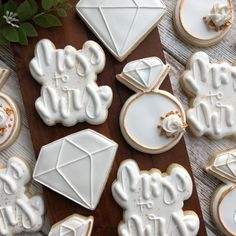 some decorated cookies are sitting on a table