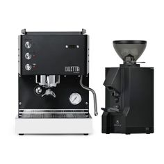 the delitta espresso machine is next to an automatic coffee maker