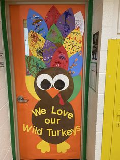 a door decorated with an image of a turkey and the words we love our wild turkeys