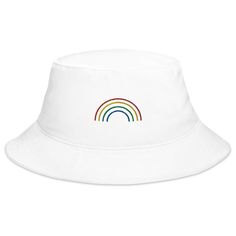 Rainbow Arch Bucket Hat! Keep the sun out of your eyes with this 100% cotton twill bucket hat. Cotton fabric and sewn eyelets are sure to help you stay cool during any activity, be it a stroll in the park or an intense game of sports. • 100% cotton twill • 2.25” brim • 3.75” crown • One size fits all • Sewn eyelets for breathability Trendy Cotton Bucket Hat With Curved Brim, Everyday Cotton Bucket Hat, White Canvas Summer Hat, White Cotton Summer Sun Hat, White Cotton Summer Hat, White Cotton Sun Hat With Short Brim, Retro Cotton Bucket Hat For Summer, Adjustable White Cotton Bucket Hat, White Brimmed Cotton Sun Hat