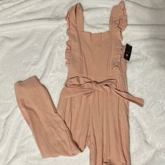 Nwt Ruffled Pink Jumpsuit. Even Has Pockets! Casual Ruffled Jumpsuits And Rompers For Brunch, Trendy Ruffled Jumpsuits And Rompers For Day Out, Fitted Ruffled Overalls Jumpsuits And Rompers, Fitted Ruffles Jumpsuit Overalls, Fitted Ruffle Jumpsuits And Rompers, Spring Jumpsuits And Rompers With Ruffled Straps, Casual Ruffled Jumpsuits And Rompers, Chic Jumpsuits And Rompers With Ruffled Straps For Spring, Chic Spring Jumpsuits And Rompers With Ruffled Straps