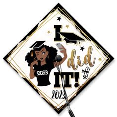 a graduation cap with the words i did it in gold and black lettering on it