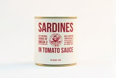 a can of sardines in tomato sauce on a white background with the words sardines