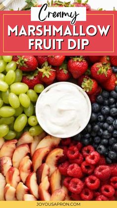 a platter filled with fresh fruit and dips for creamy marshmallow fruit dip