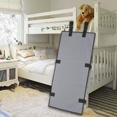 a child's bedroom with bunk beds and a stuffed animal on the top shelf