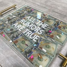 there is a sign that says all the humors are true on top of money