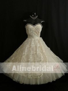 Dark Ivory Lace Sweetheart Strapless Vintage Homecoming Dresses This homecoming dress could be custom made, there are no extra cost to do custom size and color.Description of homecoming dress1, Material:lace, tulle 2, Color: picture color or other colors, there are 126 colors are available, please contact us for more colors, please ask for fabric swatch by this link: https://www.alinebridal.com/collections/extra-cost/products/fabric-swatch-fabric-sample, total cost is $20.003, Size: standard siz Cream Tulle Dress With Sweetheart Neckline, Wedding Strapless Dress With Sweetheart Neckline, White Strapless Dress With Sweetheart Neckline For Prom, Wedding Strapless Dress With Lace Bodice And Sweetheart Neckline, Cream Strapless Dress For Wedding, Vintage Bridesmaid Dress With Sweetheart Neckline, Lace Strapless Dress For Wedding And Prom Season, Wedding And Prom Season Strapless Lace Dress, Wedding Strapless Lace Dress For Prom Season