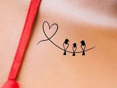 three birds are sitting on a wire with hearts drawn on the back of their backs