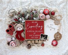 a baby announcement surrounded by christmas decorations