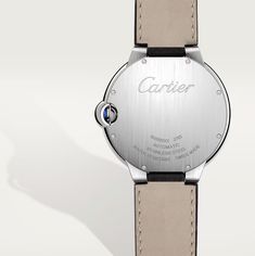 Ballon Bleu de Cartier watch, 42 mm. Mechanical movement with automatic winding, calibre 1847 MC. Steel case, fluted crown set with a synthetic cabochon-shaped spinel, silvered guilloché opaline dial. Blued-steel sword-shaped hands, sapphire crystal, black alligator-skin strap, interchangeable steel folding buckle. Calendar aperture at 3 o'clock. Thickness: 13 mm. Water-resistant to 3 bar (approx. 30 metres). Modern Chronometer Round Watch, Modern Chronometer Watch, Modern Round Chronometer Watch, Modern White Gold Round Watch Accessories, Luxury Watches With Polished Finish And Round Dial, Luxury Round Cartier Watches, White Gold Automatic Watches With Round Dial, Luxury Cartier Watch Chronometer, Luxury Cartier Watch Accessories Chronometer