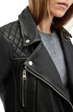 Inspired by vintage leather biker jackets, this version flaunts quilted shoulders and a lightly distressed finish to create a uniquely worn-in appearance. Front zip closure Notched lapels Zip cuffs Front zip pockets Leather Professional leather clean Imported Vintage Stores, Leather Biker Jacket, Sweaters And Jeans, Distressed Leather, Guest Outfit, Long Sleeves Jacket, Vintage Store, All Saints, Biker Jacket