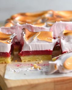 there is a piece of cake on the cutting board