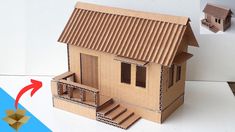 an image of a house made out of cardboard and cut into smaller pieces with arrows pointing to it