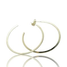 These favorited thin hoops are perfect for, everyday, and fashionable wear. As basic as your white tee, Handcrafted in 18k gold filled, these are our lightest hoops ever. Wear them all day, everyday - even while swimming ! Materials : Made in 18K Gold filled. Water resistant. Care : To learn more about keeping your jewelry shining like new, see our Product Care Guide. All Day Everyday, Hoops Earrings, White Tee, Gold Filled, To Learn, 18k Gold, Hoop Earrings, Water Resistant, Swimming