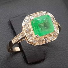 This Rare Emerald Is Breathtaking Photos Do No Justice .. It’s 1.38 Tcw Natural Emerald Surrounded With Natural Diamonds Like New Condition But Vintage Estate Size 7 Please Message Me If You Have Any Questions Also Be Sure To Check Out My Other Fine Jewelry Items!! Cluster Emerald Jewelry In Yellow Gold, Green Cluster Jewelry With Diamond Accents, Green 14k Stamped Cluster Ring For Formal Occasions, Formal Green Cluster Ring Stamped 14k, Formal Green 14k Stamped Cluster Ring, Classic Green Cluster Jewelry, Formal 14k Stamped White Gold Emerald Ring, Dazzling Emerald Ring For Anniversary In Yellow Gold, Green Hallmarked Cluster Jewelry