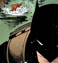 the batman is swimming in the water