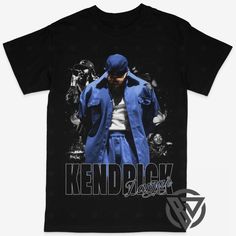 a black t - shirt with a blue jacket on it that says kend back