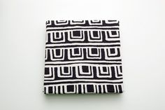 a black and white pattern on a napkin