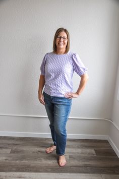 This boxy-cut jacquard texture top offers a blend of sophistication and comfort with a contemporary twist. Crafted from a blend of 95% polyester and 5% spandex, it provides a soft and stretchy feel, ensuring ease of movement and a flattering fit. The jacquard texture adds visual interest and depth to the top, enhancing its overall appeal. With its solid half sleeves, this top offers a contrast that balances the textured design. The boxy cut provides a relaxed and modern silhouette, perfect for p Spring Jacquard Knit Tops, Oversized Jacquard Knit Tops, Relaxed Fit Jacquard Knit Top, Purple Textured Knit Crew Neck Top, Soft-washed Cotton Purple Top, Soft-washed Purple Cotton Top, Older Women Fashion, Form Fitting Dress, Textured Design