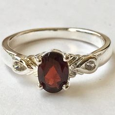 Silver Red Garnet Solitaire Cocktail Ring Dark Red Semi-Precious Garnet Stone. Made In Thailand. Dainty Styling Approximately 1 Carat Red Garnet Stone. 2 Clear Sparkly Aaa Grade Cubic Zirconias. Silver Plated Jewelers Brass Base Vintage Old Store Stock New Never Used. Comes In Sizes 6, 8 And 9. Red Stone Engagement Rings, Garnet Wedding Rings, Garnet Ring Vintage, Garnet Wedding, Wedding Rings Art, Garnet Engagement Ring, Cute Engagement Rings, Deco Engagement Ring, Garnet Stone