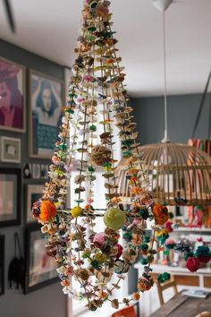 a chandelier hanging from the ceiling in a room