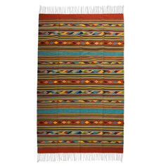 a multicolored rug with fringes on it