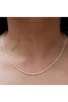 An Italian made sterling silver chain that will stand the test of time. Sterling silver Singapore chain necklace. Spring ring closure. Approx. 16" length. Made in Italy Sterling Silver Delicate Chain Necklace For Anniversary, Anniversary Sterling Silver Delicate Chain Necklace, Silver Clavicle Chain Jewelry With Oval Link, Sterling Silver Link Chain Jewelry, Silver Oval Link Clavicle Chain Necklace, Sterling Silver Clavicle Chain, Silver Clavicle Chain Necklace With Oval Links, Sterling Silver Chain Link Jewelry With Clasp, Chain Link Jewelry With Sterling Silver Clasp As Gift