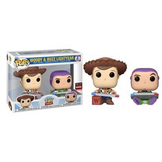 two funky pop vinyl figures are shown in their packaging boxes, one is purple and the other is green