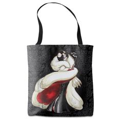 a black and white tote bag with a painting of a woman hugging a cat