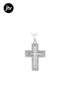 Bella Luce �� white diamond simulant 2.09ctw round and baguette, rhodium over sterling silver cross pendant with chain. Pendant measures approximately 1.31"L x 0.75"W and has a 2mm bail. Includes an 18" cable chain with a spring ring closure. The diamond equivalent weight is 1.62ctw. White Baguette Diamond Pendant Jewelry, White Baguette Diamond Jewelry Gift, White Baguette Diamond Jewelry For Gifts, White Cubic Zirconia Crucifix Jewelry, Sterling Silver Jewelry With Baguette Diamonds, Silver Sterling Jewelry With Baguette Diamonds, Elegant Cross Shaped Jewelry With Baguette Diamonds, Elegant Cross Jewelry With Baguette Diamonds, Baguette Diamond Cross Pendant Jewelry For Gifts