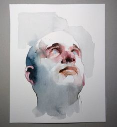 a watercolor painting of a man's face