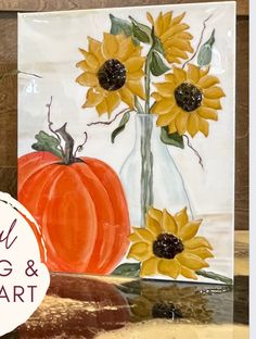 a painting of sunflowers and a vase with a pumpkin on it is shown