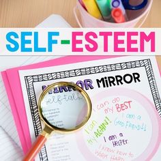 the self - esttem poster is displayed on top of a desk with pens and pencils