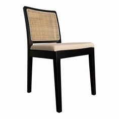 a black and white chair with a beige seat pad on it's backrest