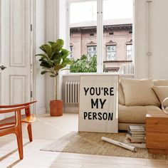 there is a sign that says you're my person on it in the living room