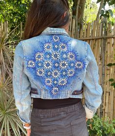 Fashionable Streetwear , cool crop jacket with pretty white daisies  Vintage jacket brought back to life with fun hand painted design .  Size small  Hand wash . Hang dry  Jacket label is : Cimarron brand Hand Painted Blue Outerwear For Spring, Hand Painted Blue Denim Jacket For Spring, Blue Hand Painted Outerwear For Spring, Trendy Hand Painted Denim Jacket For Spring, Hand Painted Trendy Denim Jacket For Spring, Blue Hand Painted Spring Outerwear, Hand Painted Blue Spring Outerwear, Spring Hand Painted Denim Jacket, Spring Hand Painted Blue Denim Jacket