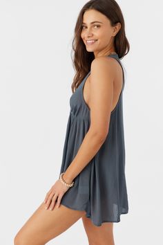 Cute and flowy cover-up dress to elevate your beach look. It features a solid color wash and deep v-neckline. O'Neill Women's woven cover-up dress Mini length Lightweight feel Solid color wash 100% Viscose Flowy V-neck Summer Beach Dress, Summer V-neck Unlined Cover-up, Flowy V-neck Sundress For Vacation, Flowy V-neck Summer Sundress, V-neck Sundress Style Cover-up For Beach Party, Unlined V-neck Cover-up For Vacation, Beach Season V-neck Sundress Cover-up, Breezy V-neck Beach Season Cover-up, Flowy V-neck Breezy Cover-up