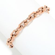 This simple oval chain link bracelet from Invicta Jewelry is just the piece you need to tie your ensemble together. While your other wrist sports your favorite Invicta watch  this bracelet adds a little extra polish and a sleek  flowing design. In your choice of color  these durable stainless steel links work overtime to elevate your style! Classic Rose Gold Metal Chain Bracelet, Rose Gold Chain Link Bracelet, Modern Rose Gold Oval Link Chain Bracelet, Classic Rose Gold Oval Link Chain Bracelet, Modern Rose Gold Box Chain Bracelet, Modern Rose Gold Metal Chain Bracelet, Rose Gold Oval Link Paperclip Bracelet, Rose Gold Metal Bracelet With Rectangular Links, Rose Gold Chain Bracelet With Adjustable Rectangular Links