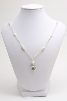 "It can always be Spring with this lovely lily necklace! The center drop consists of a lily petal encompassing a single Swarovski pearl, and topped another Swarovski pearl. The sides include more pearls and silver spacers for added style mingled throughout the sterling silver figure eight chain. The back closes with a sterling silver lobster clasp. The lily is matte silver-plated brass and measures 0.75\" in length. The entire focal drop measures 1.25\" long. The pearls measure 6mm, 4mm & 2mm an Silver Teardrop Pearl Pendant Necklace, Silver Teardrop Drop Necklace With Pearl Charm, Lily Necklace, Geode Necklace, Pearls Necklace, Gold Pearl Necklace, Infinity Necklace, Freshwater Pearl Bracelet, Wedding Jewellery Necklace