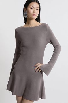 Feel Confident In Our Mini Dress, Made In Knit Fabric, Featuring An Ultra Minimal Design, With A Figure Hugging Fit That Flares Out Into A Short Skirt, And Sleeves With Peplum Detailing. Style It With Block Heels Or Ankle Boots For A Look Perfect For Days Out, Then Wear It With Heeled Boots Or Strappy Heels For An Evening Look. Rib Knit Peplum Sleeve Flippy Mini Dress High Quality Knit Fabric Flattering Figure Hugging Bodice Feminine Flared Skirt Unique Slash Neckline Long, Flared Sleeves Peplum Dress For Women, Long Sleeve Dress Ankle Boots, Ribbed Dress Boots, Ahort Dress Boots, Ankle Boot With A Dress, Accessories For Dark Grey Dress, Ribbed Fit And Flare Dress, Grey Long Sleeve Mini Dress, Flared Sleeve Dress