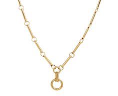 Whether worn alone or with an added pendant, this Foundrae necklace is a modern alternative to the traditional chain. The mid-length necklace is composed of Foundrae's signature golden element links. One chubby annex link hangs from the center of the clockweight pendulum pendant and opens, creating the perfect backdrop for one or more of your favorite Foundrae charms. total length : 24" : 18K yellow gold18K yellow gold chubby annex link : 1/2" diameter18K yellow gold lobster clasp closure Luxury Brass Chain Necklace With Round Pendant, Luxury Delicate Chain Brass Necklace, Luxury Brass Clavicle Chain Necklace, Luxury Yellow Gold Charm Necklace With Clavicle Chain, Luxury Brass Pendant Chain Necklace, Luxury Gold Necklace With Polished Finish, Luxury Hallmarked Pendant Chain Necklace, Luxury Gold Nickel-free Necklace, Luxury Brass Chain Necklace For Everyday