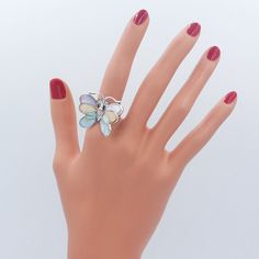 ◆ Short description Never lose hope, a butterfly proofs itself, beautifully emerging from a cocoon. Decorated with multiple colors, the ring gives out vivid emotion, becoming pastel colors under the light.  The ring is made of authentic dyed mother-of-pearl, enhancing gloss to its surface, and authentic 925 sterling silver, 100% nickel free. A reminder to never lose hope, a special gift with special meanings. ◆ Product attribute Approximate Weight:  11.00 grams. Vertical Dimension: 24 mm. Material: 100% Authentic 925 Sterling Silver, Authentic Dyed Mother-of-pearl. ◆ How can we offer high-quality products at good prices!. - We don't buy products from wholesalers or any middlemen - Free of warehouse cost. Therefore, the stock-management cost isn't included in the products. ◆ Our GUARANTEE - Adjustable White Butterfly Ring, Bohemian Butterfly Ring As A Gift, Bohemian Butterfly Ring As Gift, Unique Multicolor Butterfly Jewelry, Silver Butterfly Ring, Pearl Rings, Never Lose Hope, Sensitive People, Colorful Butterfly