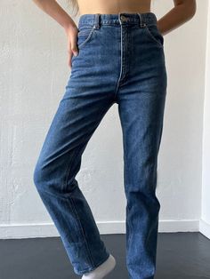 Medium wash high waisted jeans with a zip fly, belt loops and pockets. Has some stretch. In excellent vintage condition. DETAILSLabel: BoroMaterial: 98% Cotton, 2% PolyurethaneSIZE & MEASUREMENTSWaist: 30"Hips: 32"Rise: 11.5"Inseam: 29"Leg Opening: 7.5" High Waist Dark Wash Pants With Zip Fly, High Waist Flare Jeans With Zip Fly, Dark Wash Rigid Denim Bottoms With Zip Fly, Fitted Straight Leg Jeans With Belt Loops, Medium Wash Straight Leg Bottoms With Belt Loops, Straight Leg Medium Wash Bottoms With Belt Loops, Straight Denim Bottoms With Belt Loops, Dark Wash Straight Zip Fly Bottoms, Classic Full-length Jeans With Belt Loops