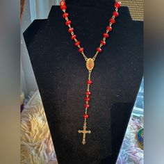 Beautiful Rosary With Red Beads. The Cross Is In Gold Super Cute. Red Round Beaded Necklaces For Valentine's Day, Red Round Beads Necklace For Valentine's Day, Valentine's Day Red Beaded Necklaces, Red Faceted Beads Jewelry For Valentine's Day, Red Beaded Chain Necklace For Valentine's Day, Spiritual Red Jewelry With Faceted Beads, Handmade Red Rosary For Jewelry Making, Red 8mm Beaded Jewelry For Valentine's Day, Adjustable Red Beaded Rosary